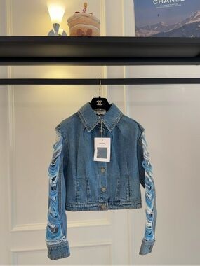 CHANEL Light Blue Denim Jacket with Sculpted Sleeve Detail